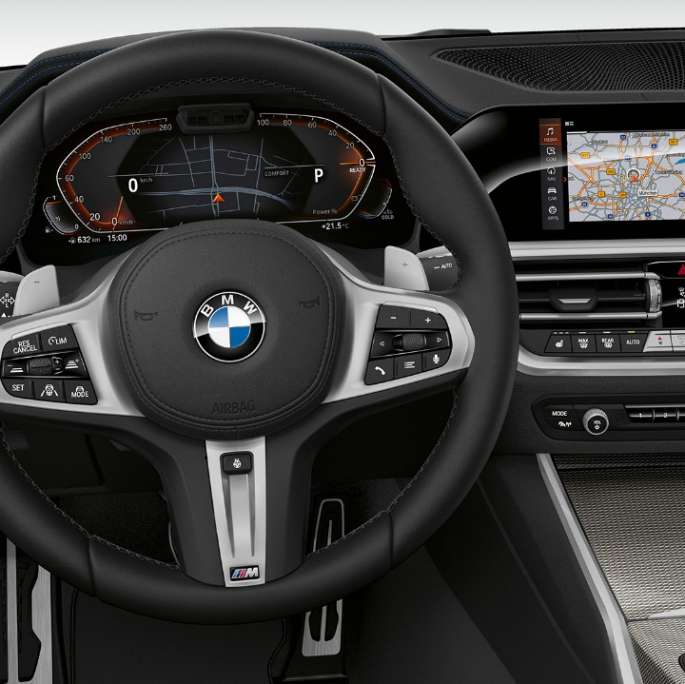 BMW Série 3 Sedã, Cockpit da vrsão Sport. Vista frontal em primeiro plano do cockit a cabine do motorista do BMW Série 3 Sedã com os recursos do Modelo Sport Line.