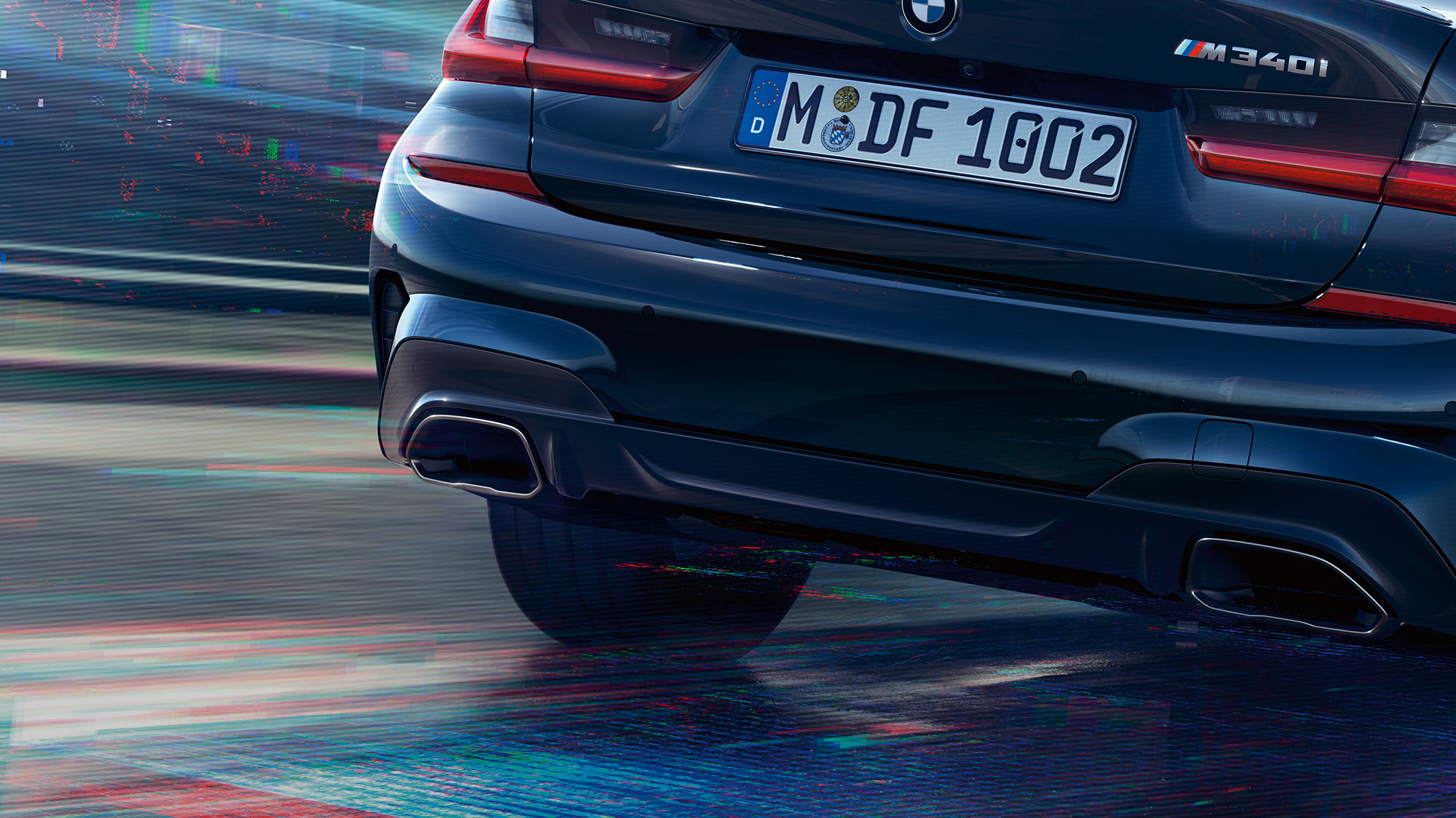 Acabamento dos escapamentos do BMW M340i xDrive Sedan Imagem ampliada do acabamento dos escapamentos do BMW M340i xDrive Sedan G20 Preto safira metálico
