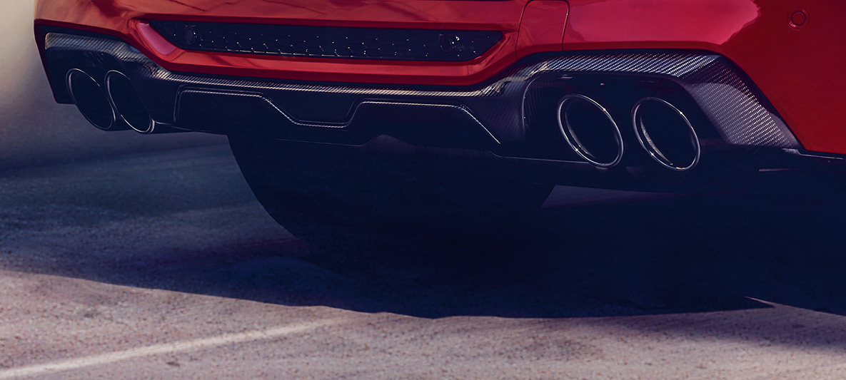 BMW X4 M Competition, difusor traseiro em carbono. BMW X4 M Competition em vermelho metálico Toronto, exterior, pacote externo de M Carbon, difusor traseiro em carbono.