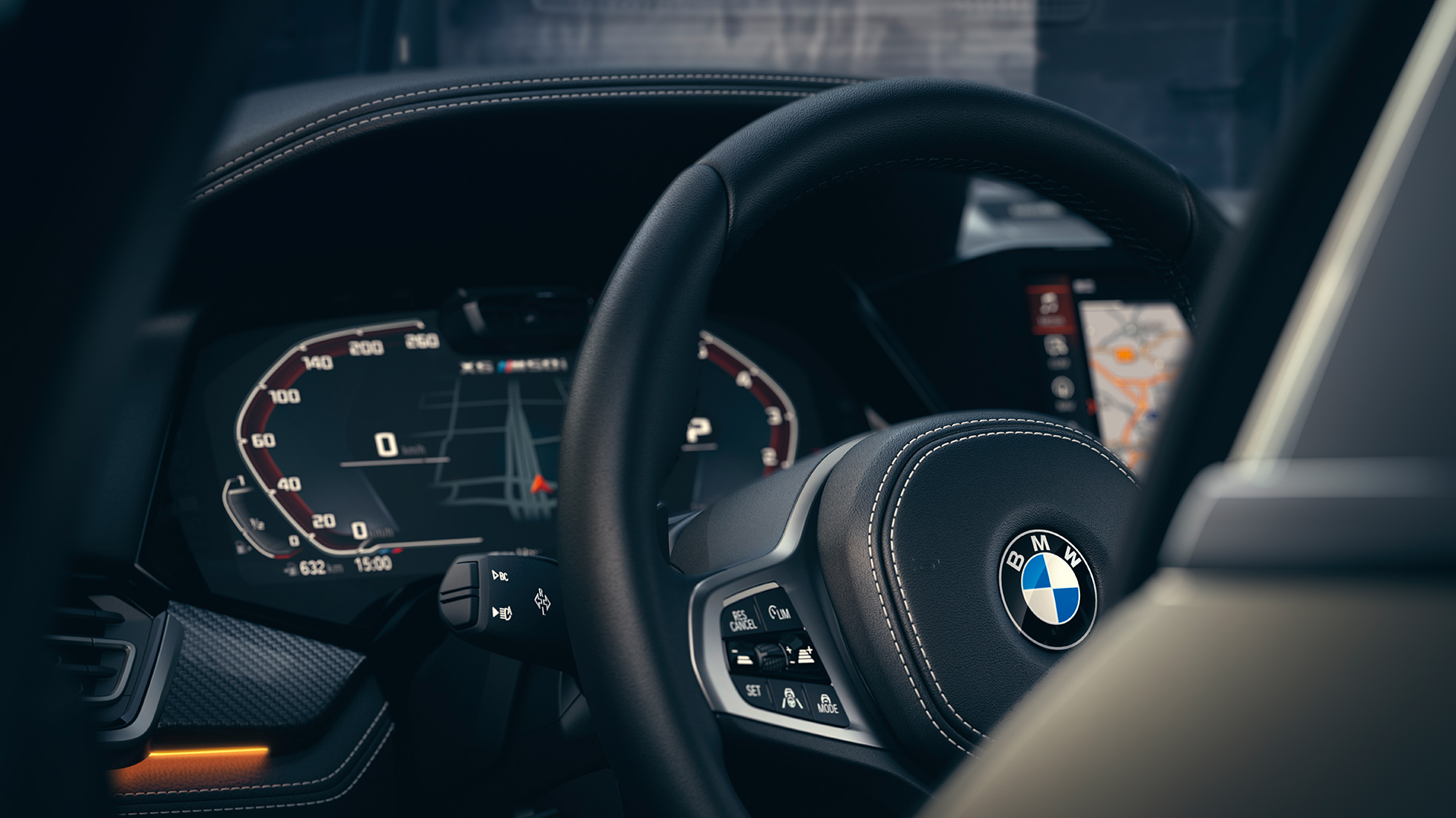 Sistemas de auxílio BMW. Imagem ampliada do interior do BMW com foco no painel de instrumentos.
