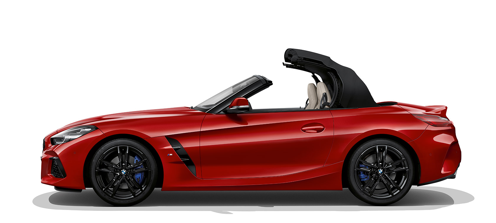 Vista lateral do BMW Z4 Roadster Vista lateral do BMW Z4 Roadster, teto durante a abertura